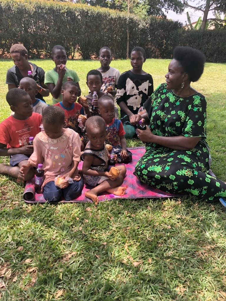 Dr. Josephine with children at the Ssanga Home
