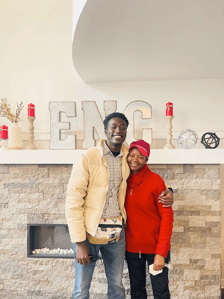 Mathew and Mom Annet Kalisa