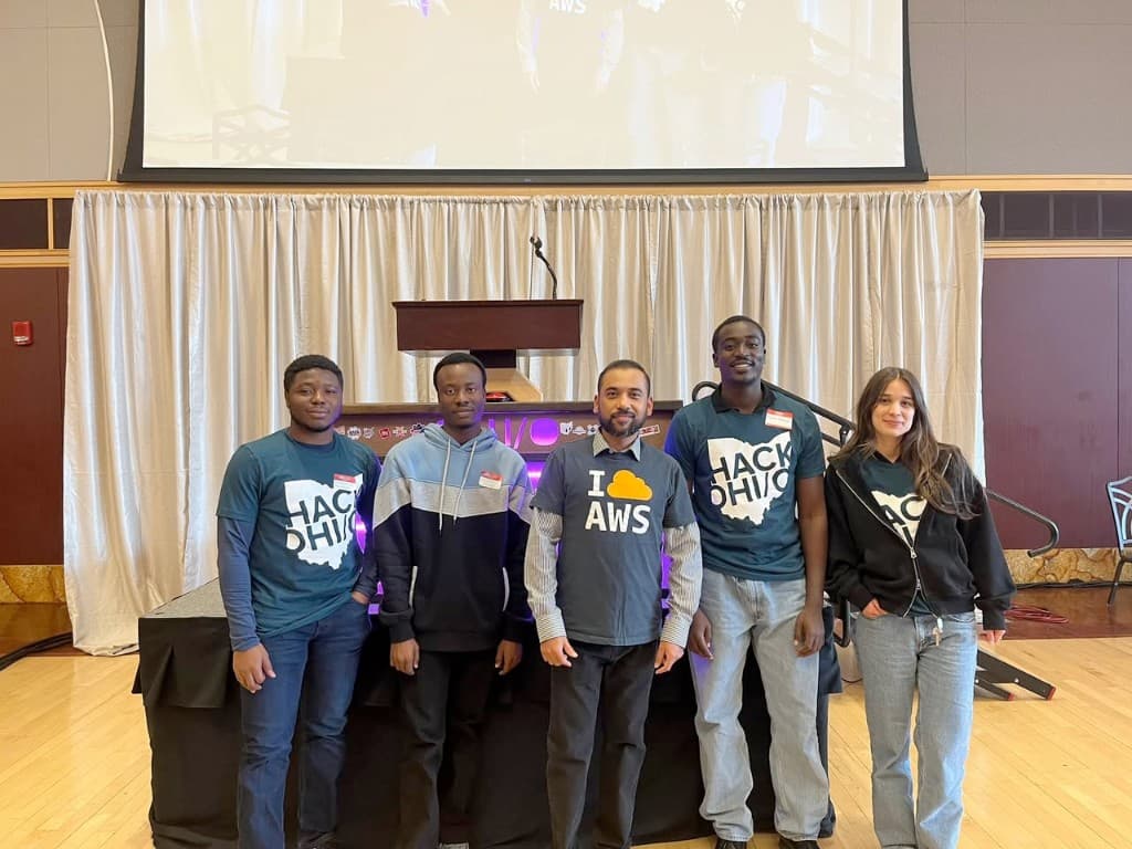 Mathew and his team at HackOHI/O 2025