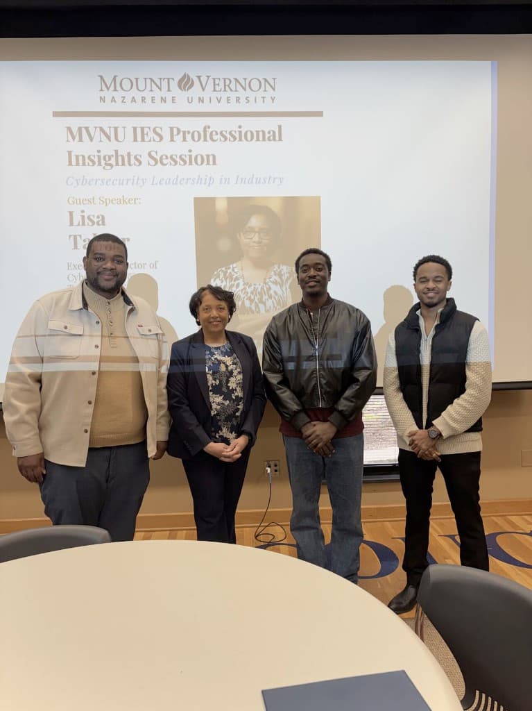 Mathew with VP Tavaris Taylor, Josiah Munro, and JPMorgan Chase Executive Director Lisa Tabler