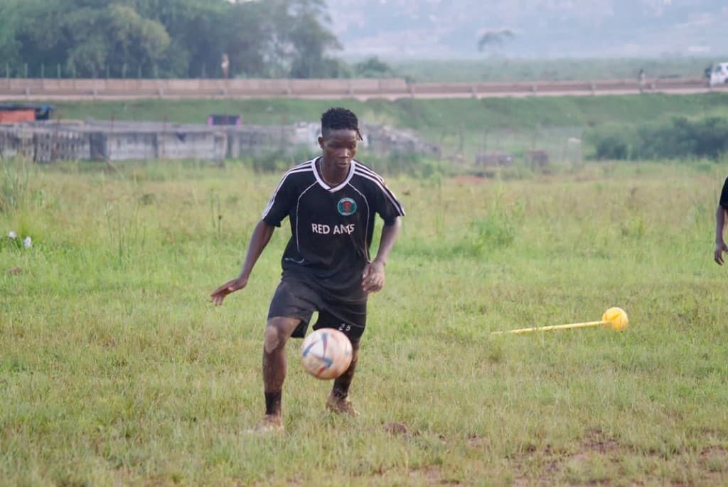 Samson practicing ball control with the Red Ants