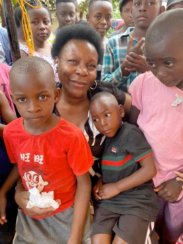Dr. Josephine with children in Ssanga