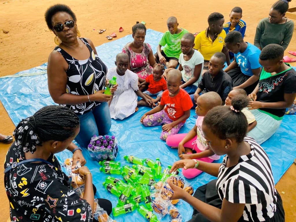 Dr. Josephine and the BLF team feeding children